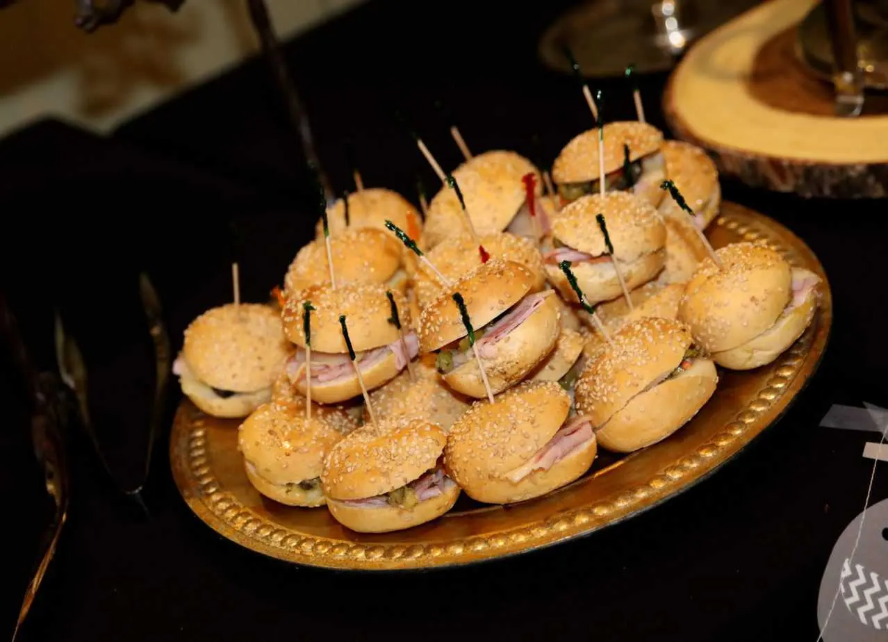 Tray of slider sandwiches at a catered event